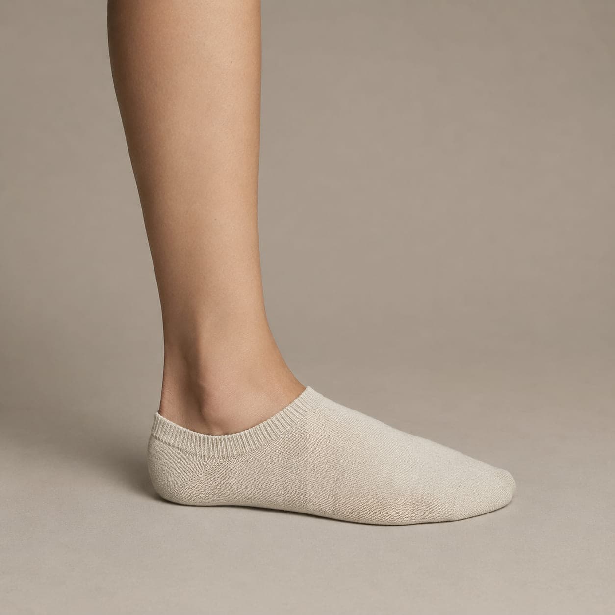 Boat 52 Wide worn on a foot, seen from the side, with the cuff edge visible above the heel.